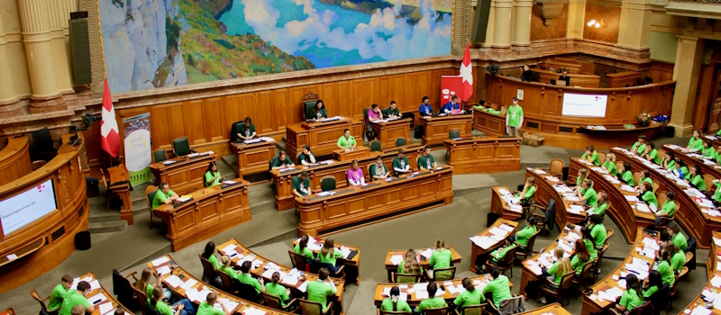 Young people sitting in the Swiss National Council in Bern during the Federal Youth Session